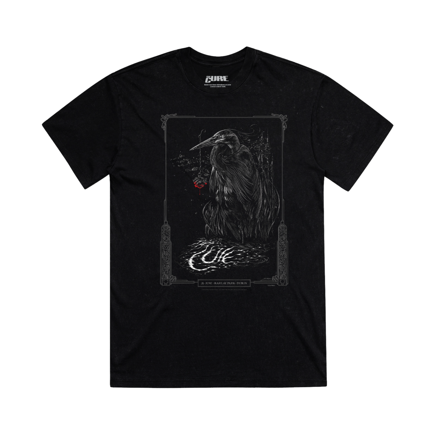 Black t-shirt with a graphic design of a black and white heron with decorative elements and  event details for The Cure's performance at Marlay Park in Dublin, Ireland on June 26, 2026.