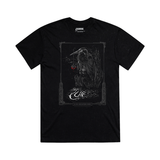 Black t-shirt with a graphic design of a black and white heron with decorative elements and  event details for The Cure's performance at Marlay Park in Dublin, Ireland on June 26, 2026.